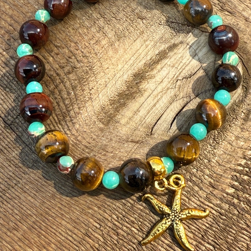 Gold Starfish Charm with tiger eye beads and emerald small spacers bracelet.